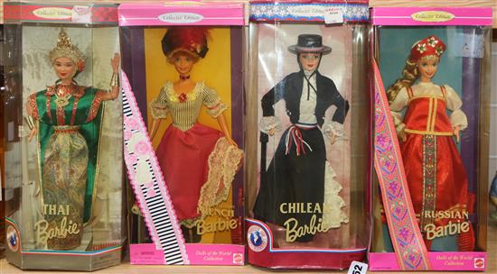 Four Barbie costume dolls, mint and boxed